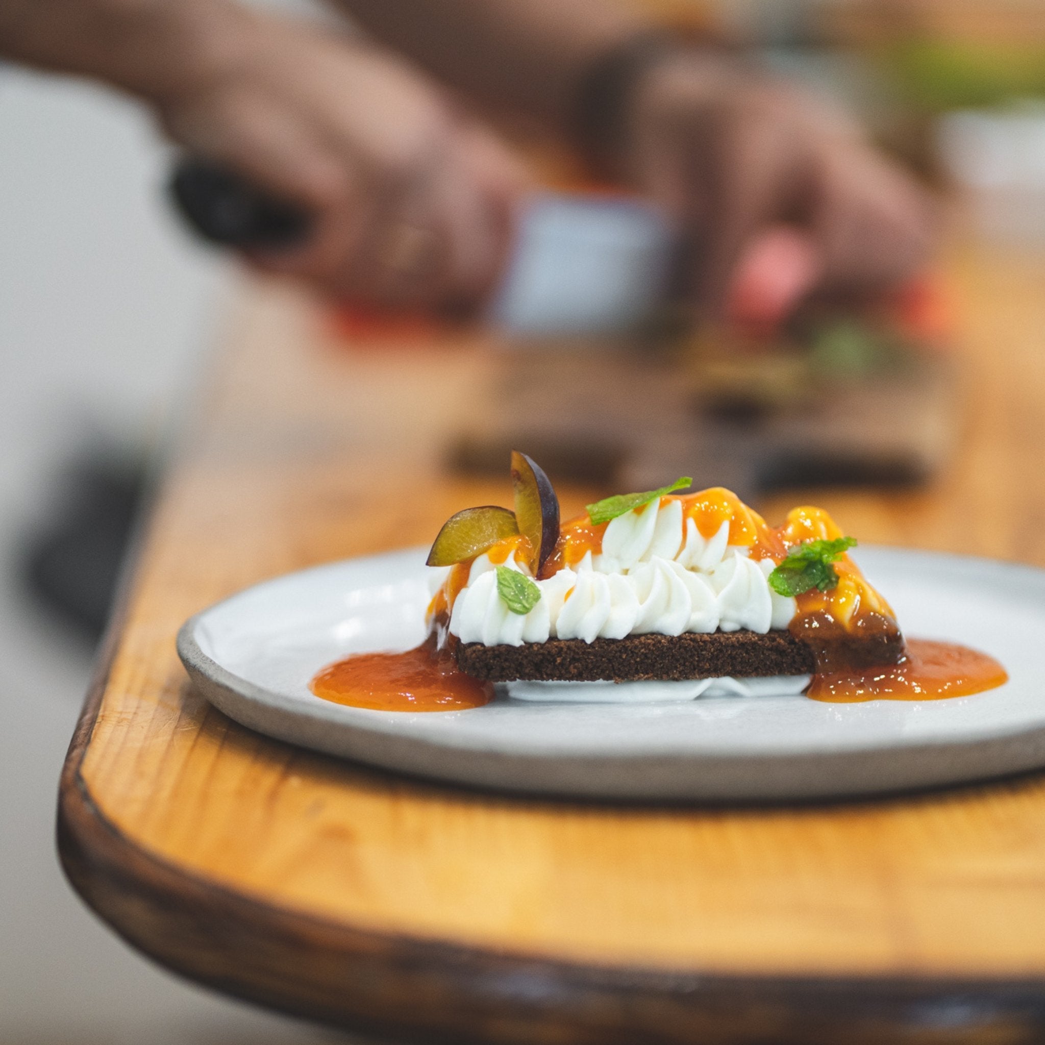 BIOLEA organic olive oil with Nerantzi oranges covering the raw cheesecake. 