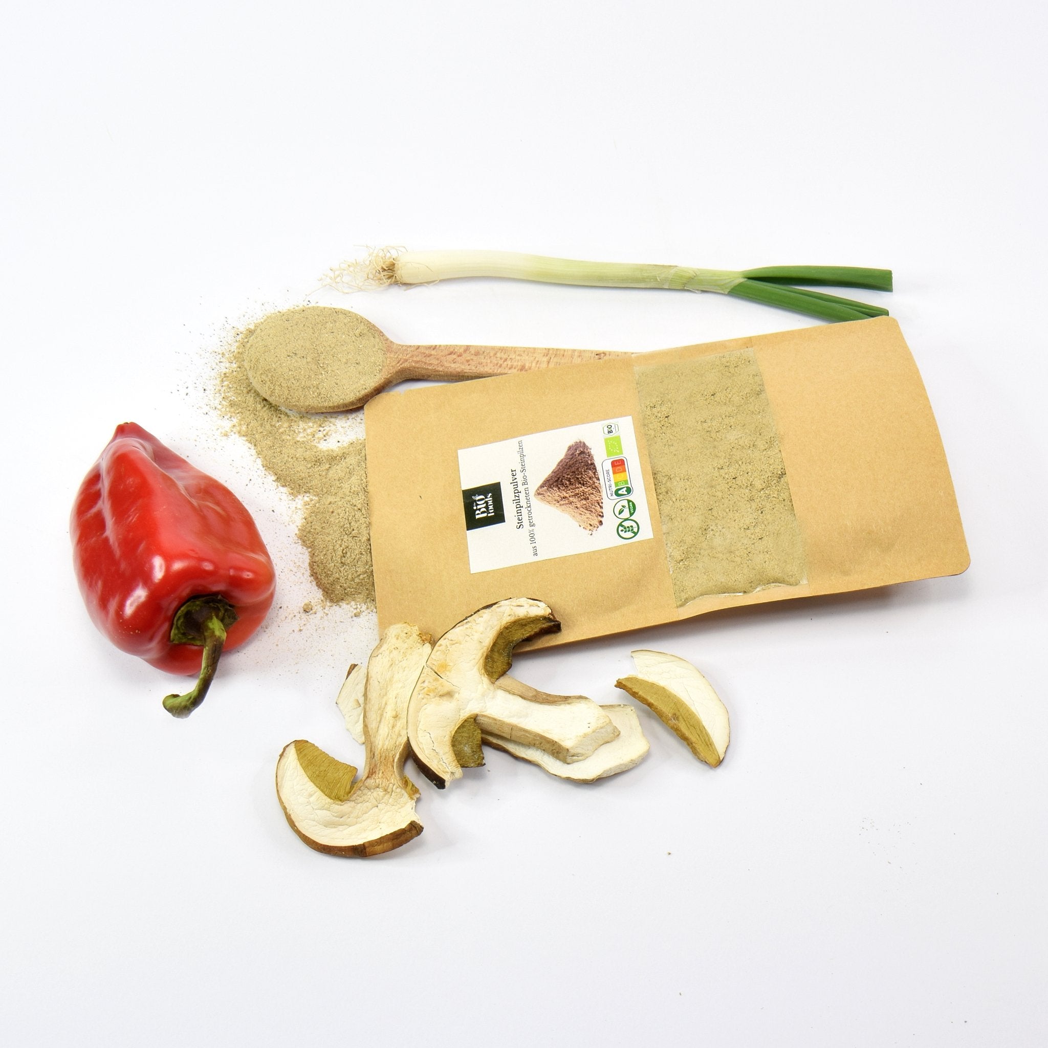 Organic Porcini Powder with entire piece of porcini mushroom next to the package - The Bio Foods