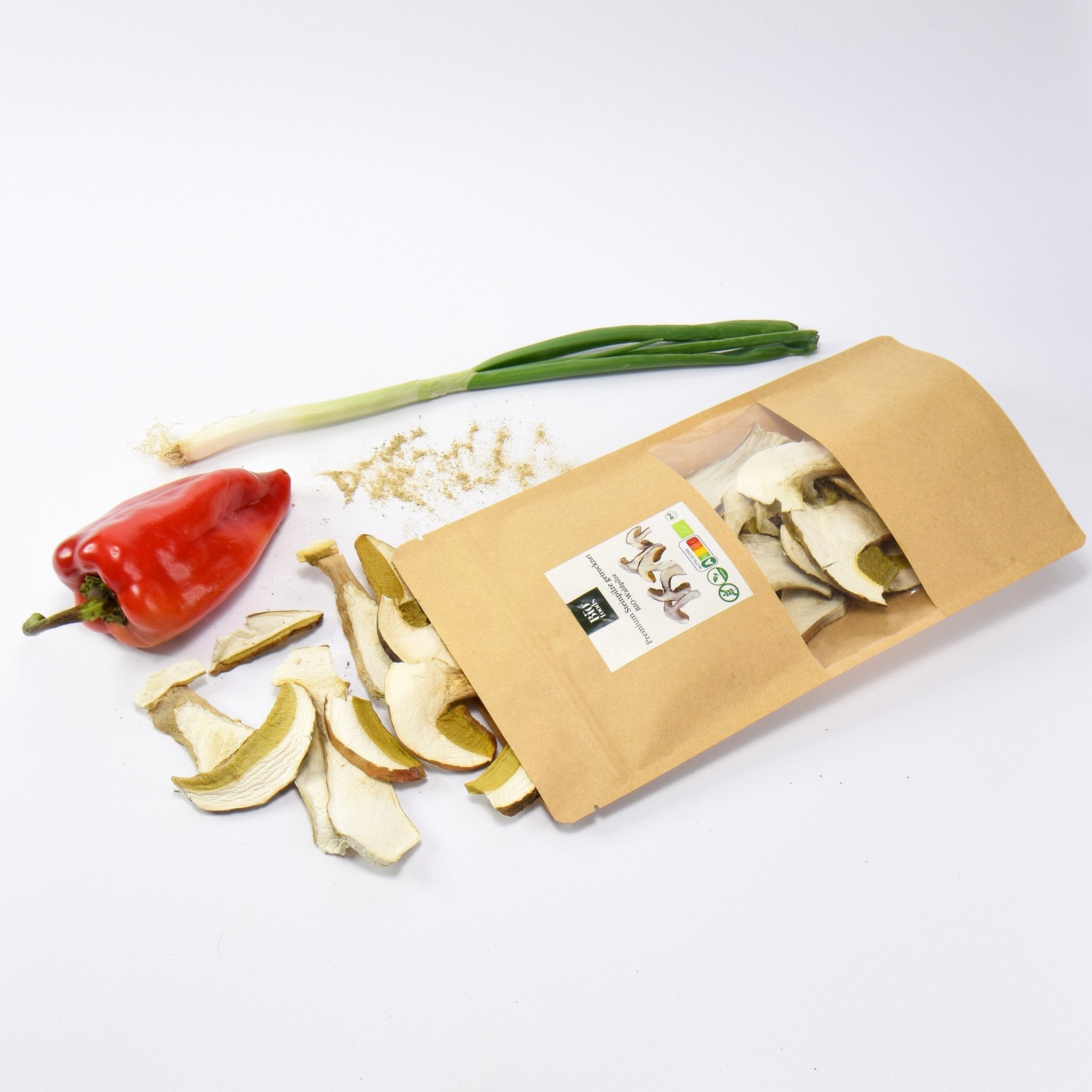 Organic Premium Dried Porcini  on the table. Bright and big pieces of mushrooms. Grade AA available at The Bio Foods shop